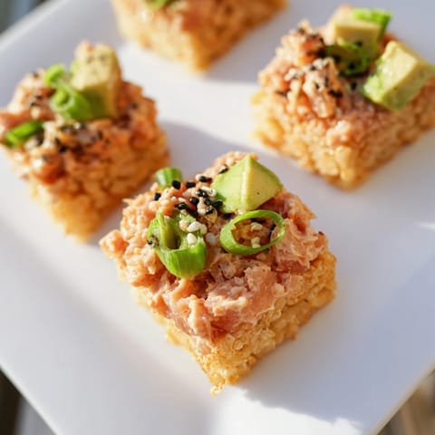 A close-up shot of Spicy Tuna Crispy Rice: beautifully arranged and ready to be enjoyed as a snack.