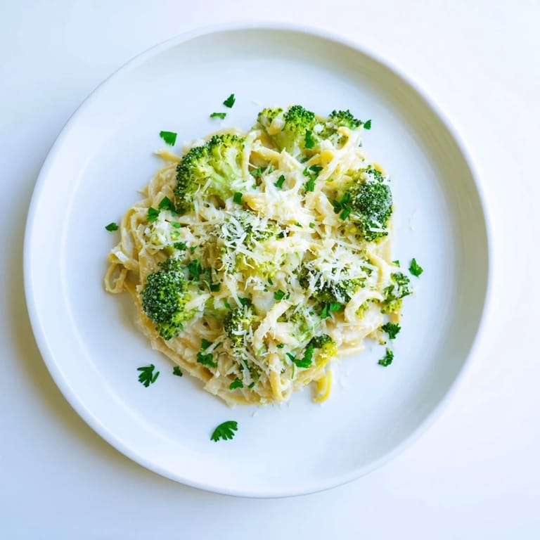 A single pot of One-Pot Lemon Broccoli Pasta features bright lemon zest and garlic-infused sauce, ideal for an easy vegetarian weeknight meal.