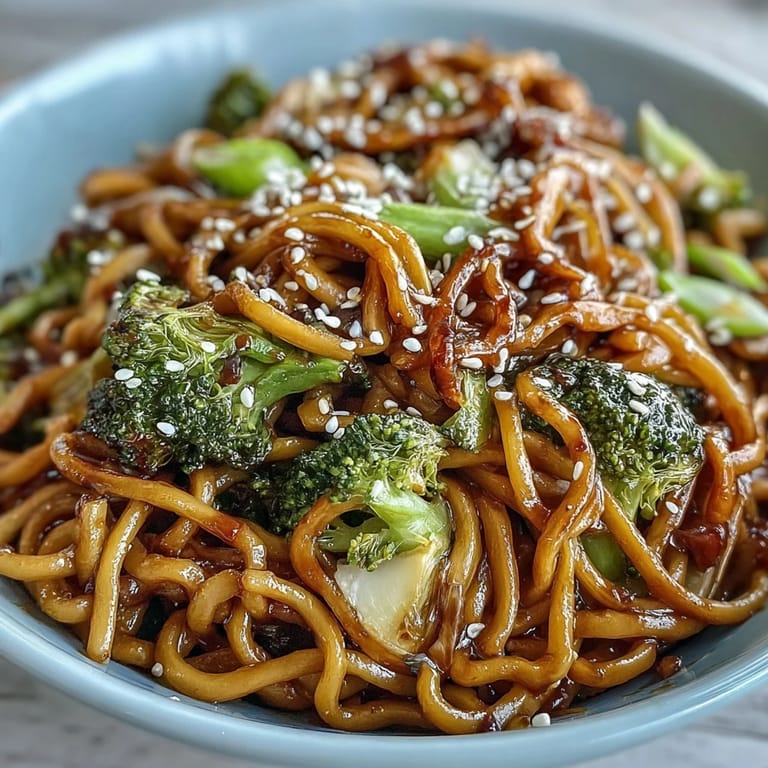 Glossy teriyaki sauce coats tender egg noodles and crunchy vegetables in this steaming, vibrant Asian Teriyaki Noodle Bowl.